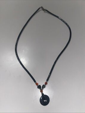 Gunmetal Beaded Necklace with Circular Pendant and Heart, Orange Accent Beads